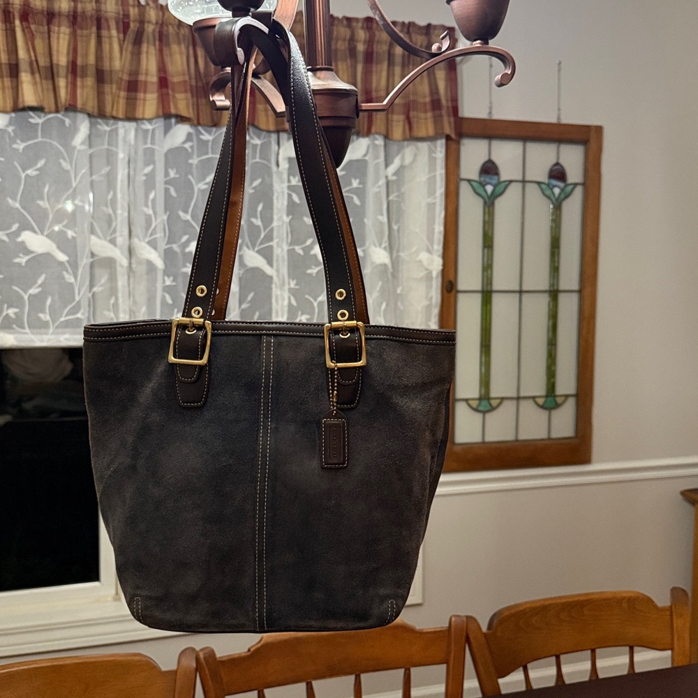 Coach navy suede Leather Tote with brown leather straps beautiful lining bottom.